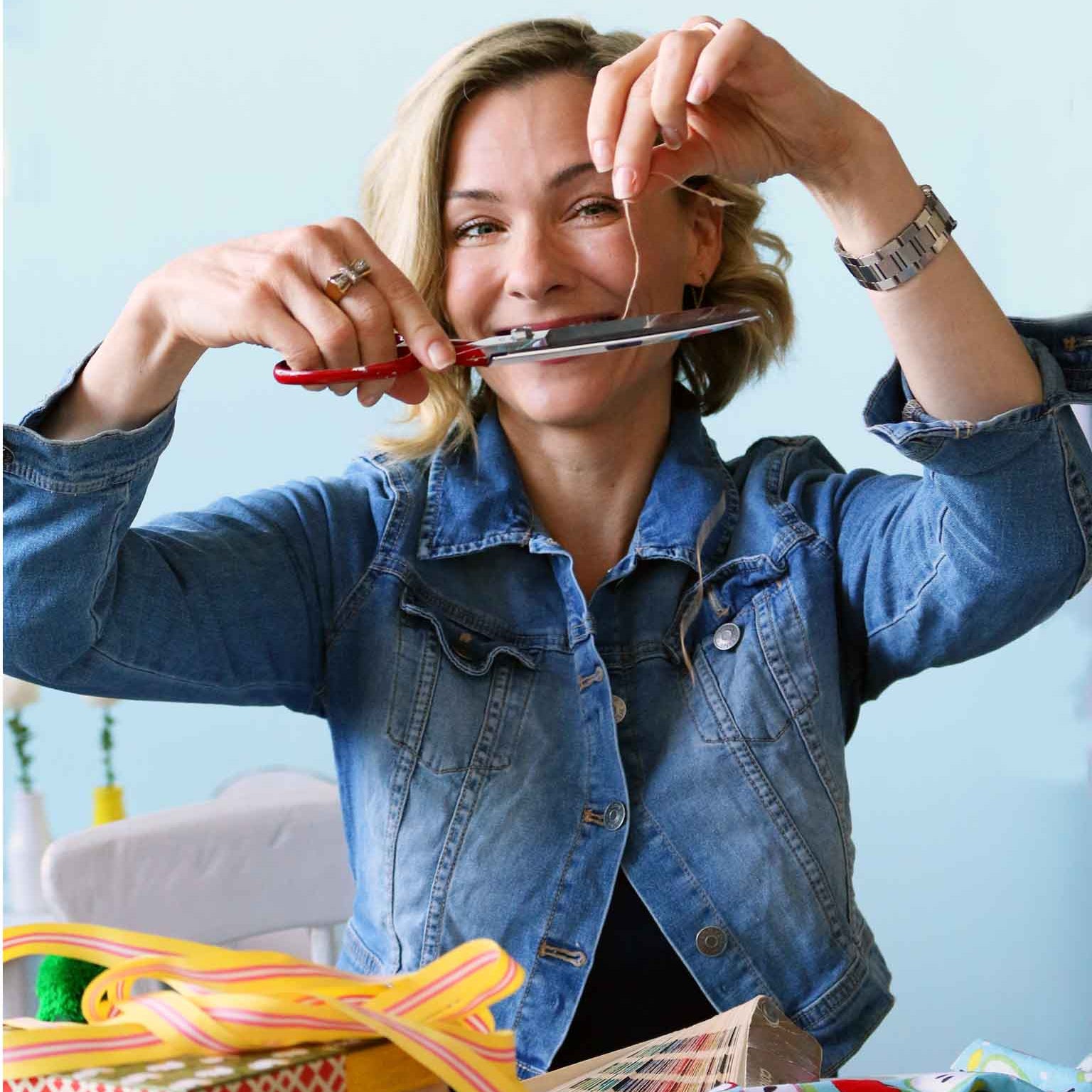 a photo of a woman sewing clothes