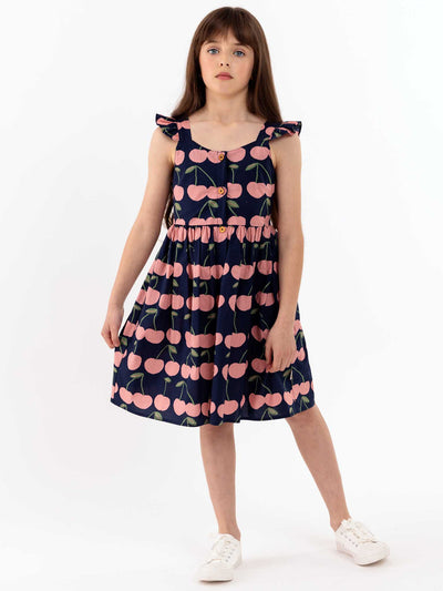 A comfy summer Navy Cherry Calista Dress with cherries on it, perfect for girls.
