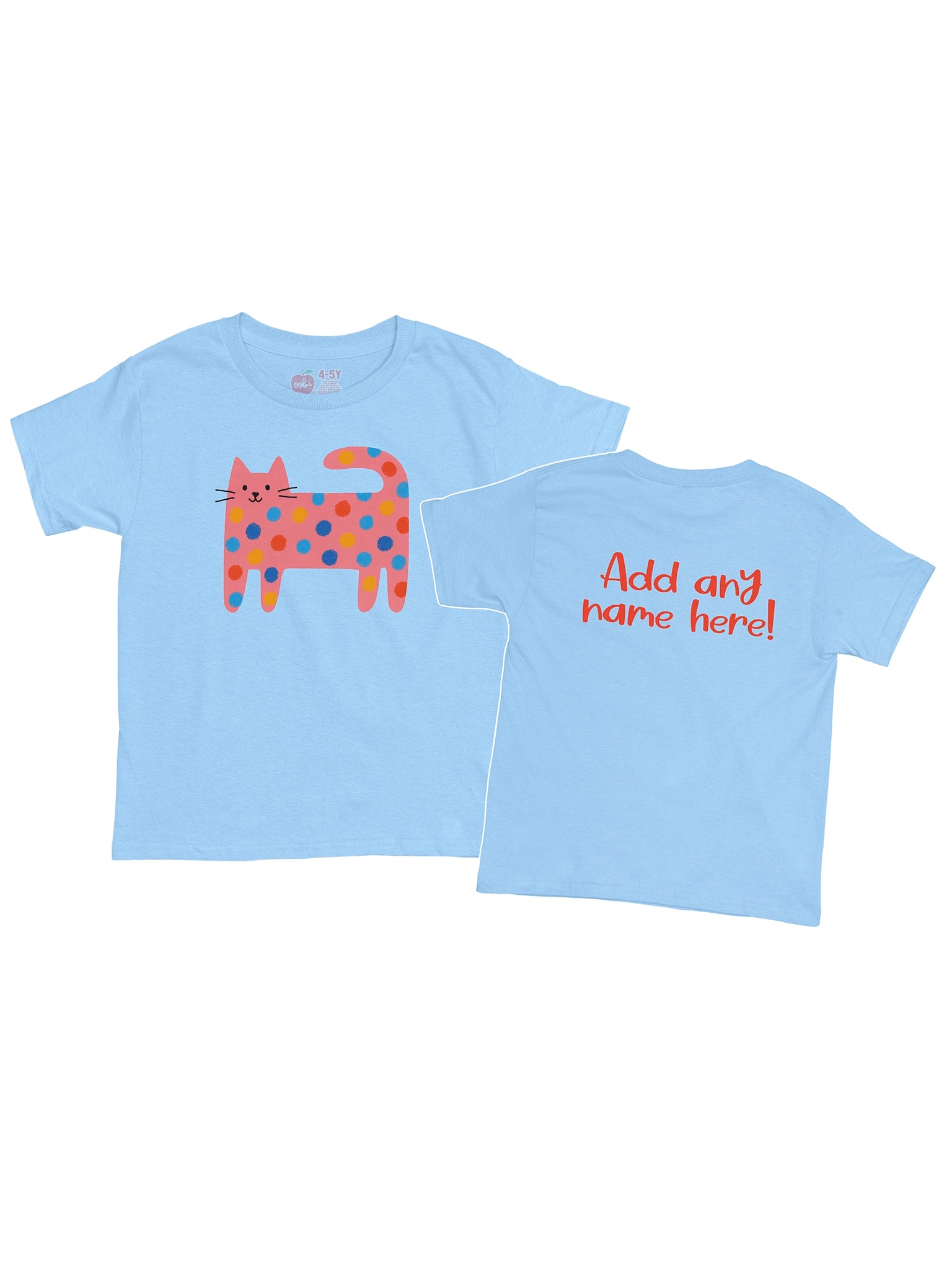 The Essentials Cat Printed Tee is a light blue, oversized 100% cotton shirt with a cartoon orange cat and colorful spots on the front, plus “Add any name here!” in red on the back. Ethically made for comfort and style.