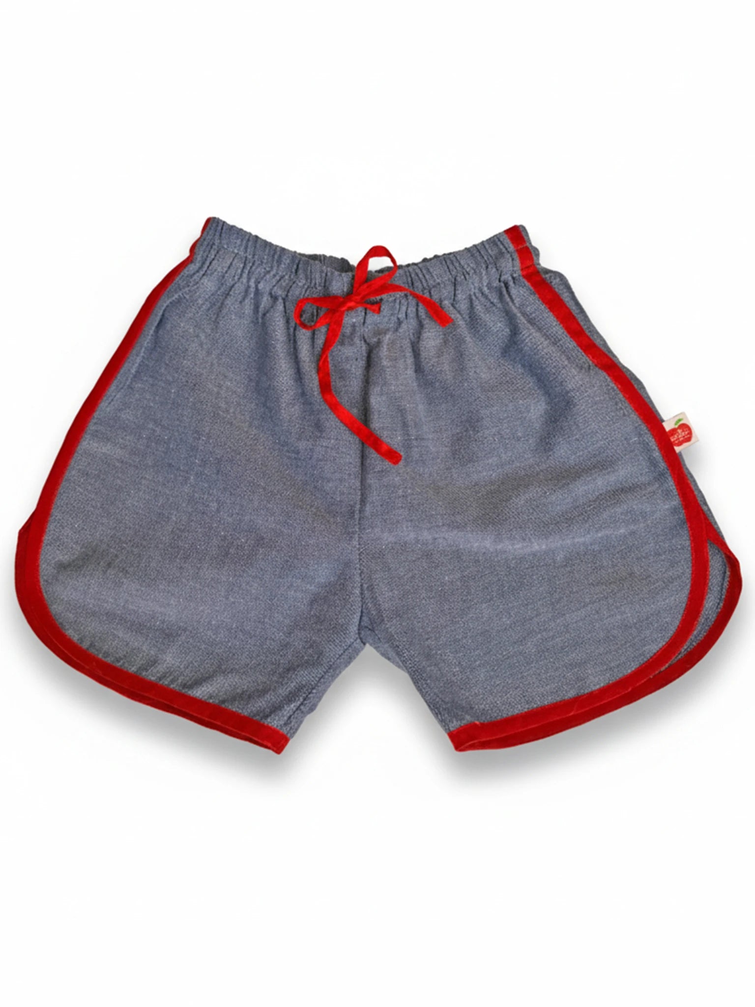 Essentials Chambray Shorts With Retro Curve: gray unisex cotton shorts with red trim, red drawstring, and elastic waist, shown laid flat on a white background.