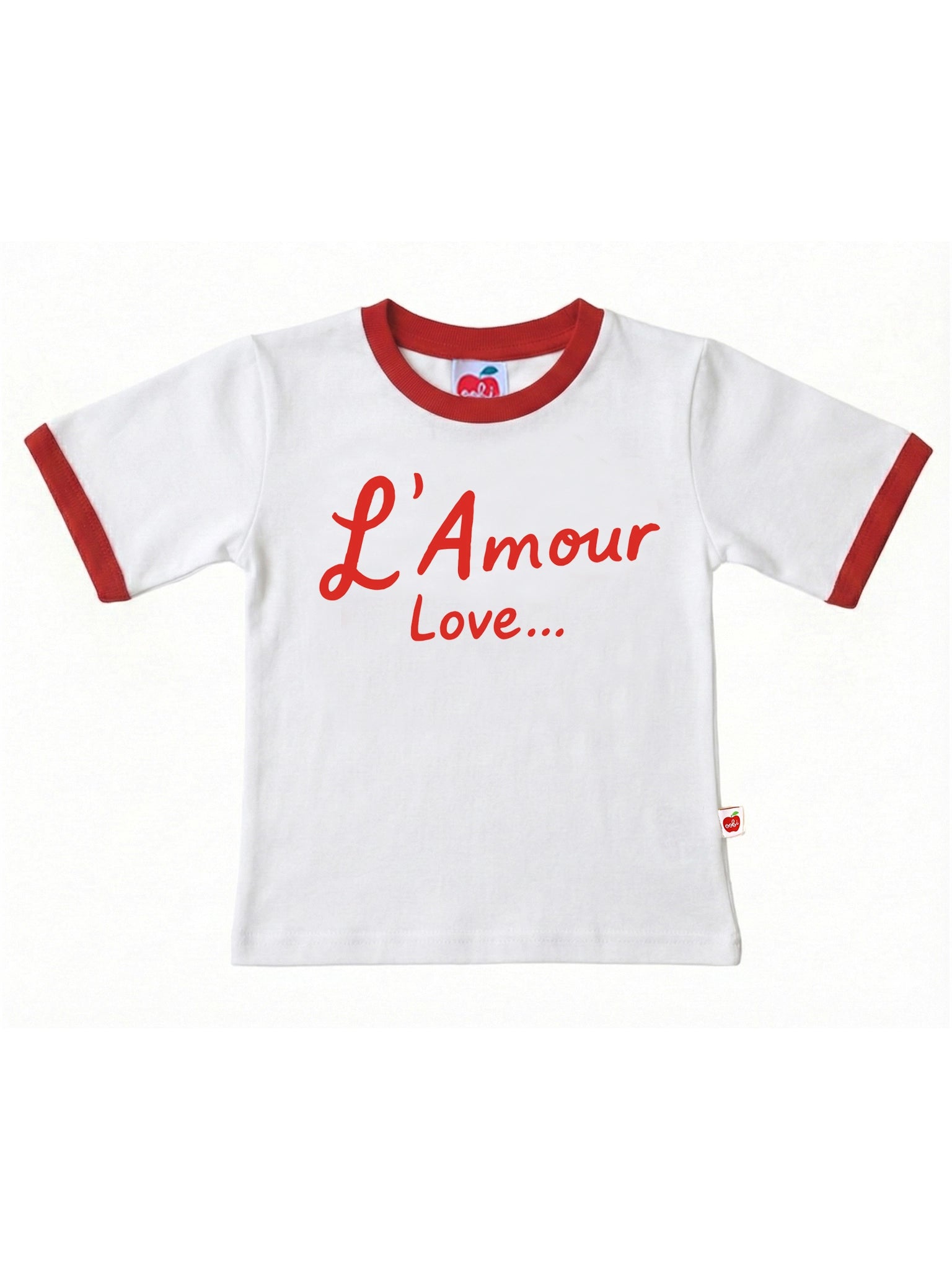 The Essentials L'Amour (Love) Tee with Red Binding is a 100% cotton white T-shirt featuring red trim and "L'Amour Love..." printed in red on the front for a stylish, comfortable look.