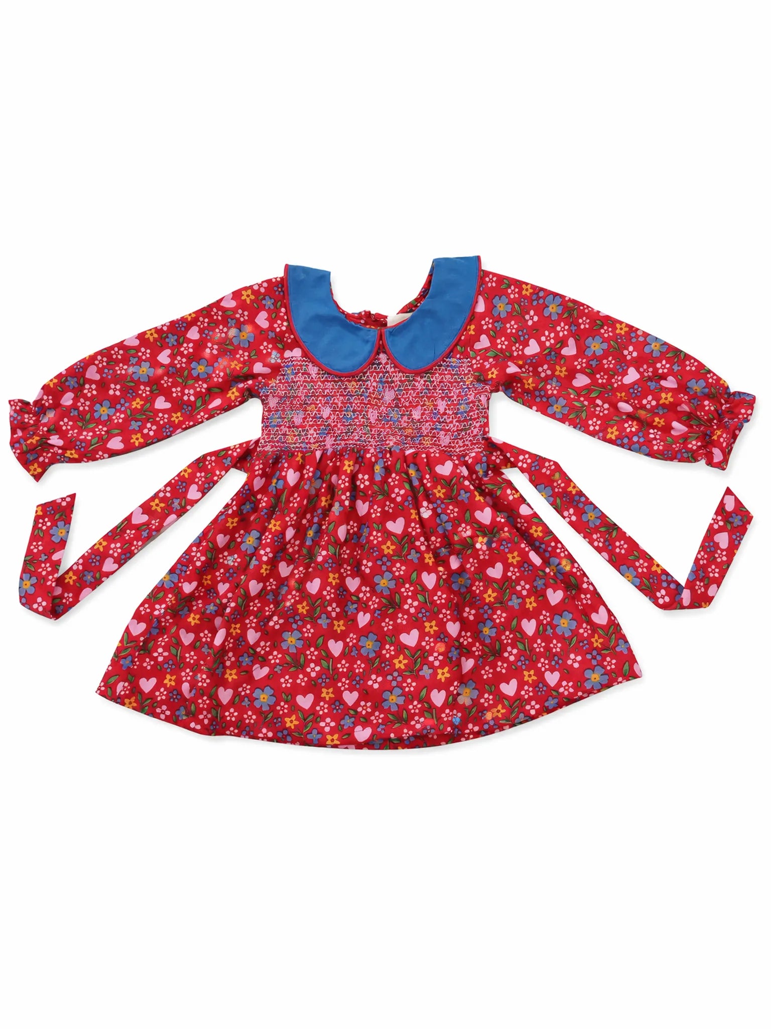Red floral dress with a blue collar on a white background