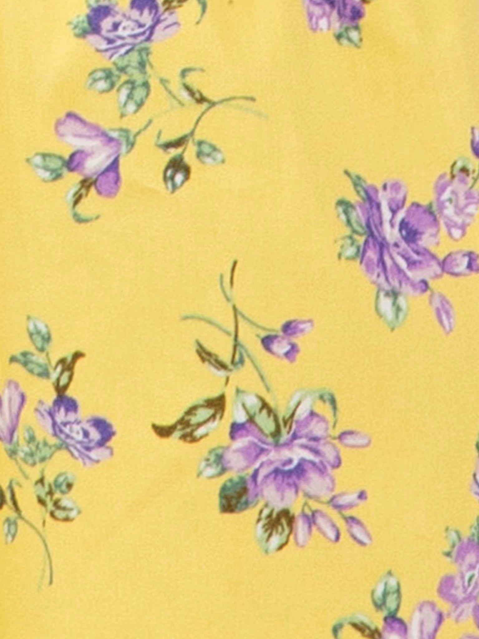 Floral pattern with purple flowers on a yellow background