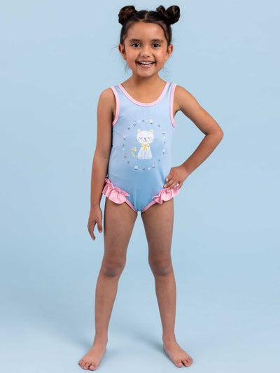 An Aussie girl in a blue and pink Smitten Kitten One Piece Swim swimsuit, affectionately known as a Cat.