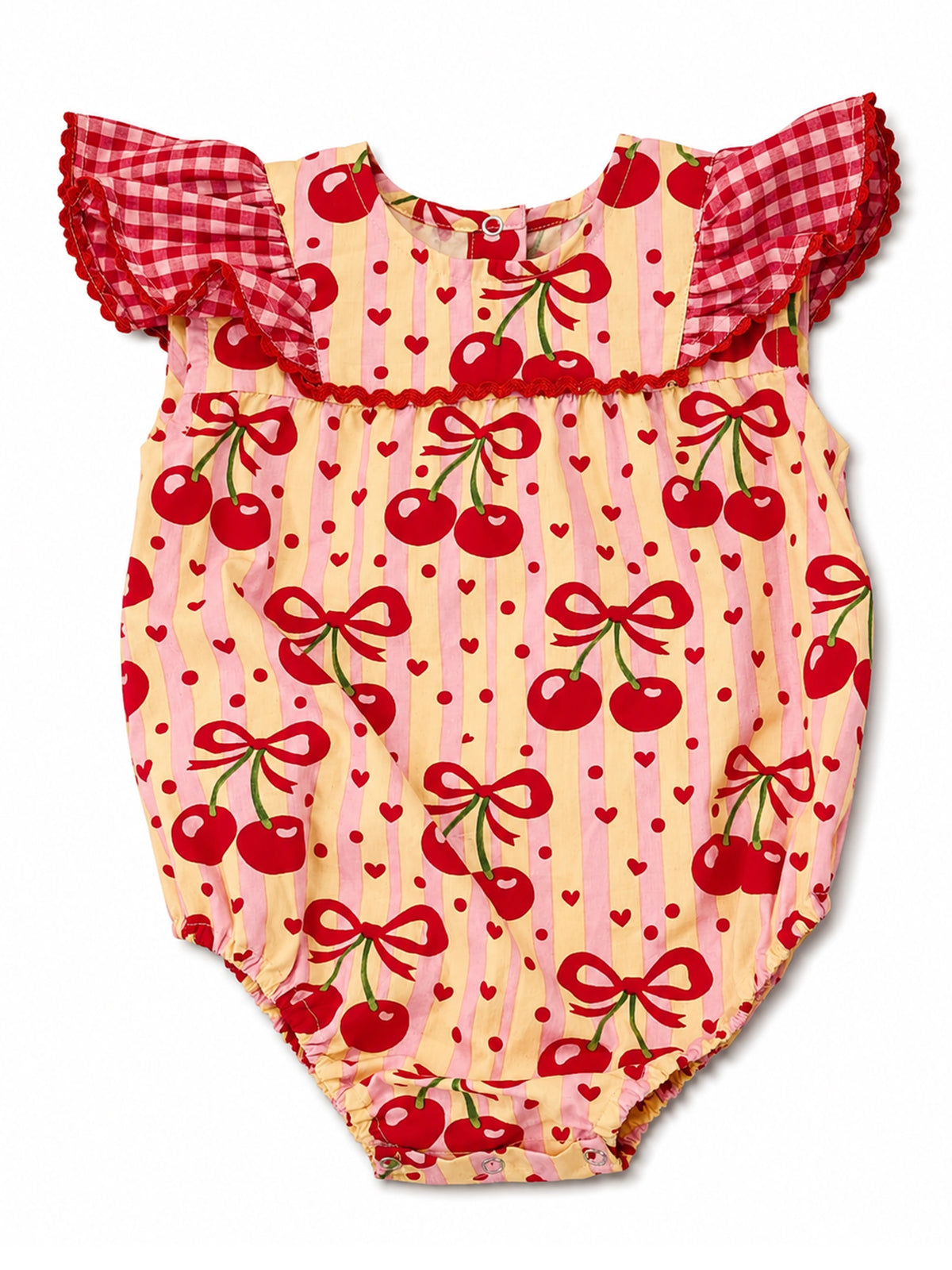 Baby romper with cherry and bow pattern on a white background