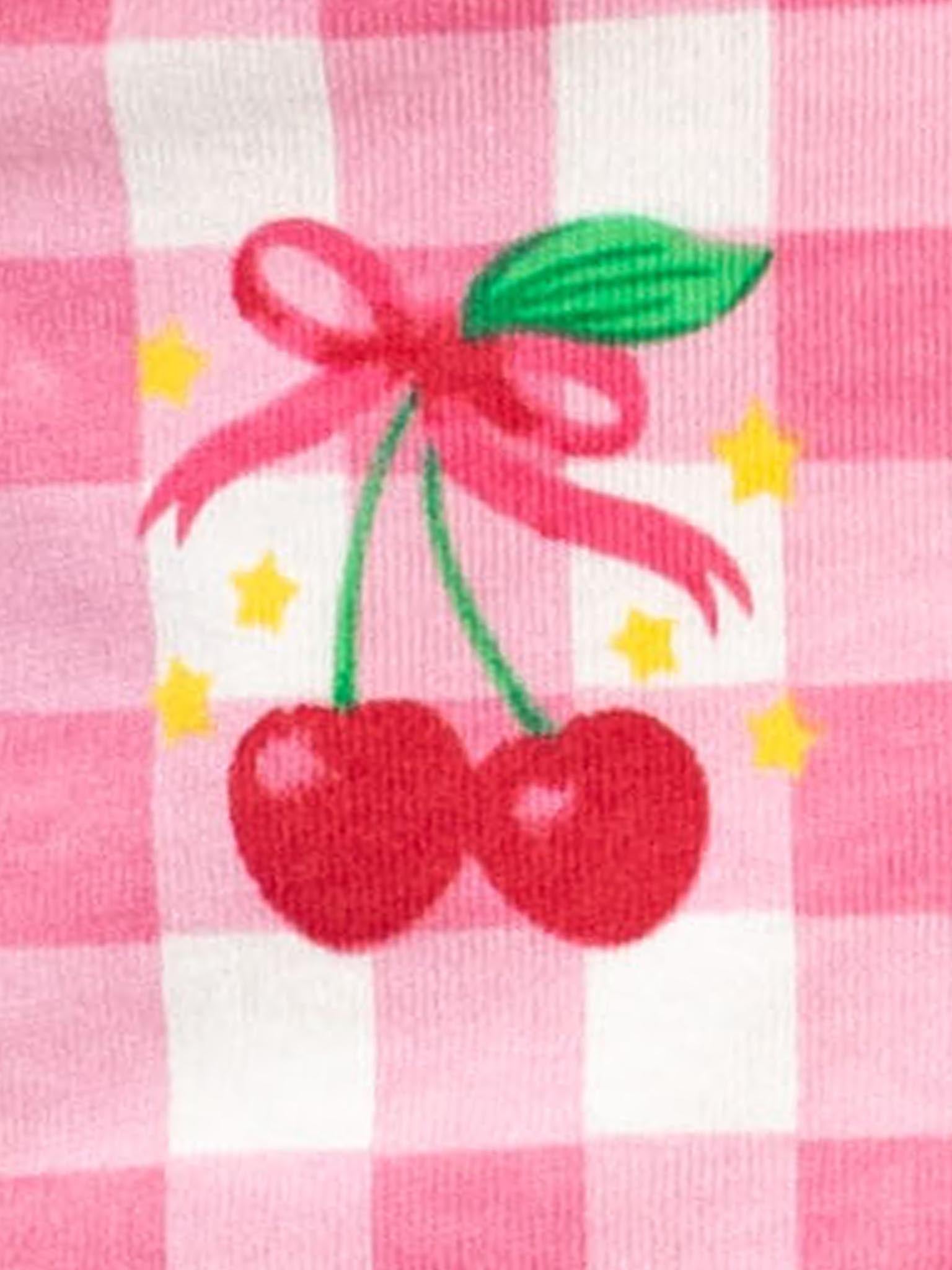 The Cherry Gingham Tutu Dress by Cherry Gingham features red cherries with green stems, a pink ribbon, and yellow stars on a pink and white gingham background—perfect inspiration for any girl's cherry or gingham-themed outfit.