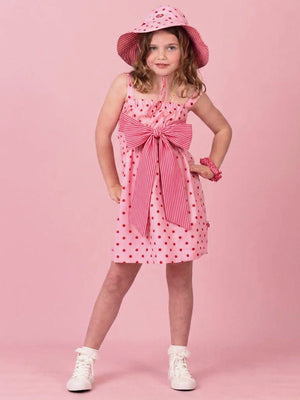 Girl in Pink & Red Dots Marlow dress with big striped bow and sun hat