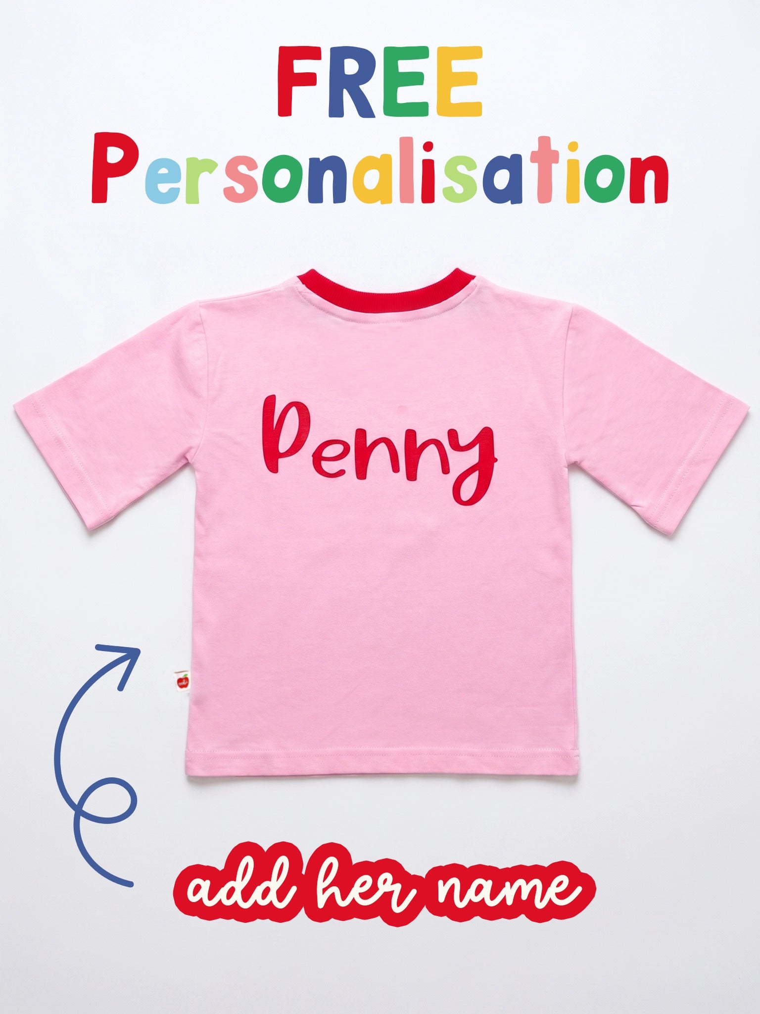 A pink short-sleeve baby t-shirt with 'Penny' written in red script across the chest, displayed on a white background with promotional text overlays reading 'FREE Personalisation' and 'add her name'.